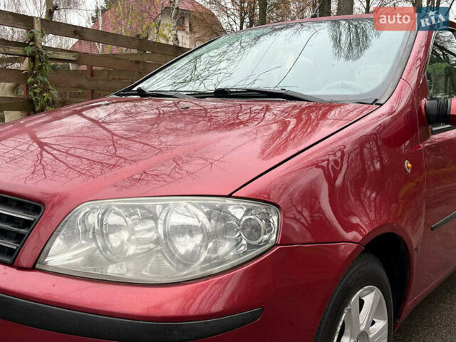 Красный Фиат Пунто, объемом двигателя 1.3 л и пробегом 234 тыс. км за 3990 $, фото 3 на Automoto.ua