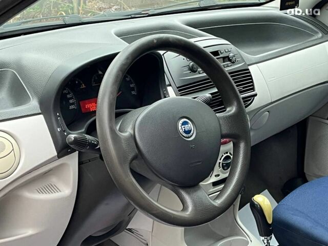 Красный Фиат Пунто, объемом двигателя 1.3 л и пробегом 234 тыс. км за 3990 $, фото 12 на Automoto.ua