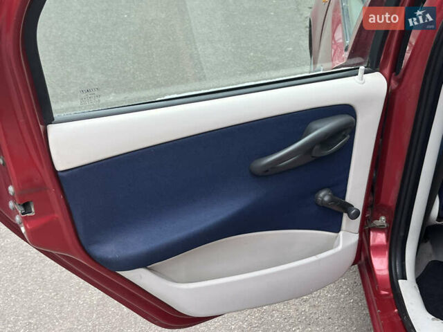 Красный Фиат Пунто, объемом двигателя 1.24 л и пробегом 234 тыс. км за 3890 $, фото 22 на Automoto.ua