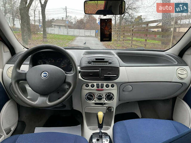 Красный Фиат Пунто, объемом двигателя 1.3 л и пробегом 234 тыс. км за 3990 $, фото 6 на Automoto.ua
