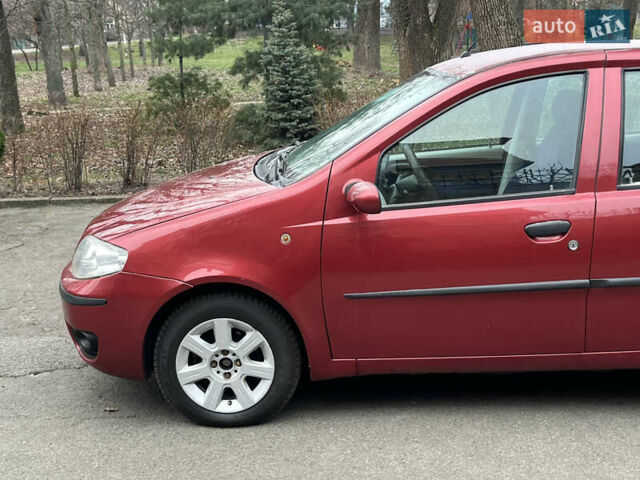 Красный Фиат Пунто, объемом двигателя 1.24 л и пробегом 234 тыс. км за 3890 $, фото 11 на Automoto.ua