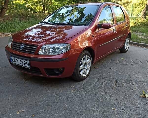 Красный Фиат Пунто, объемом двигателя 1.24 л и пробегом 233 тыс. км за 3700 $, фото 7 на Automoto.ua