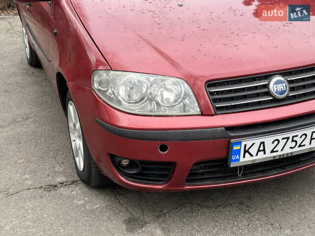 Красный Фиат Пунто, объемом двигателя 1.24 л и пробегом 234 тыс. км за 3890 $, фото 3 на Automoto.ua