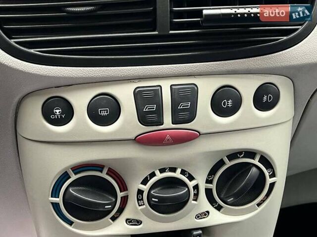 Красный Фиат Пунто, объемом двигателя 1.3 л и пробегом 234 тыс. км за 3990 $, фото 11 на Automoto.ua