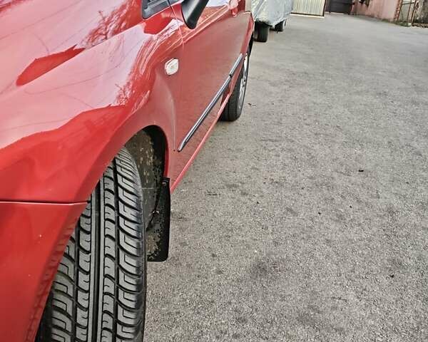 Красный Фиат Пунто, объемом двигателя 1.37 л и пробегом 110 тыс. км за 5300 $, фото 11 на Automoto.ua