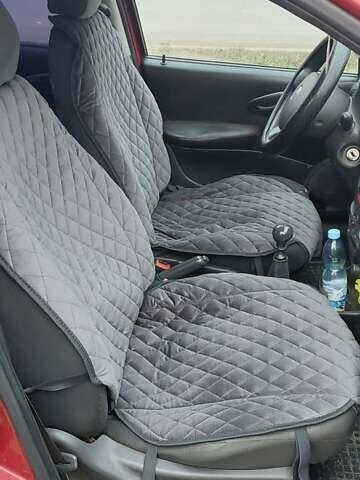 Красный Фиат Пунто, объемом двигателя 1.24 л и пробегом 280 тыс. км за 2499 $, фото 2 на Automoto.ua