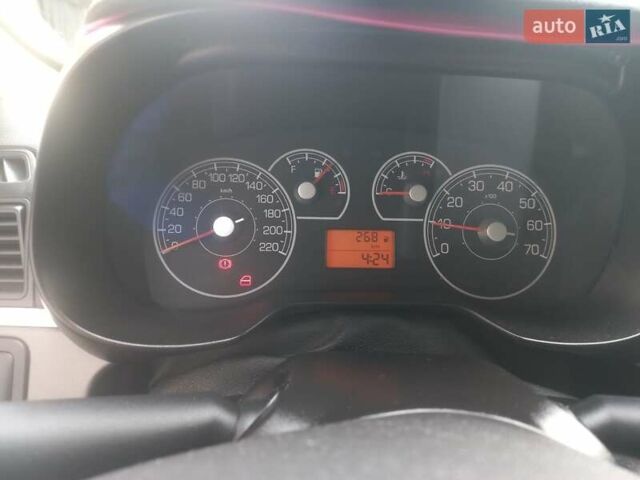 Червоний Фіат Пунто, об'ємом двигуна 1.25 л та пробігом 229 тис. км за 4100 $, фото 1 на Automoto.ua