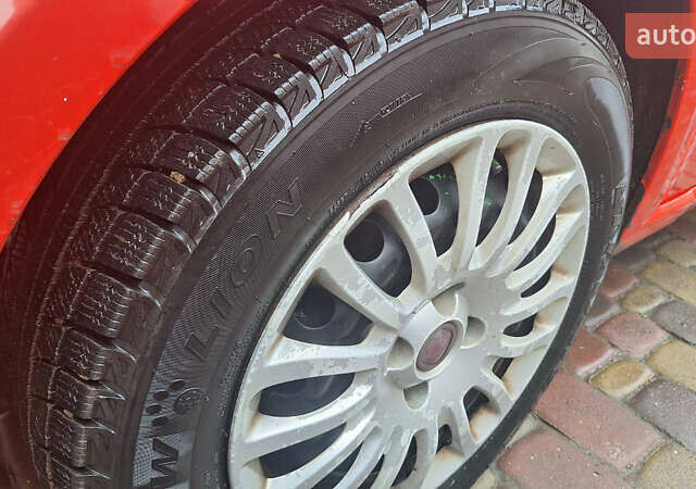 Красный Фиат Пунто, объемом двигателя 1.37 л и пробегом 174 тыс. км за 3500 $, фото 7 на Automoto.ua