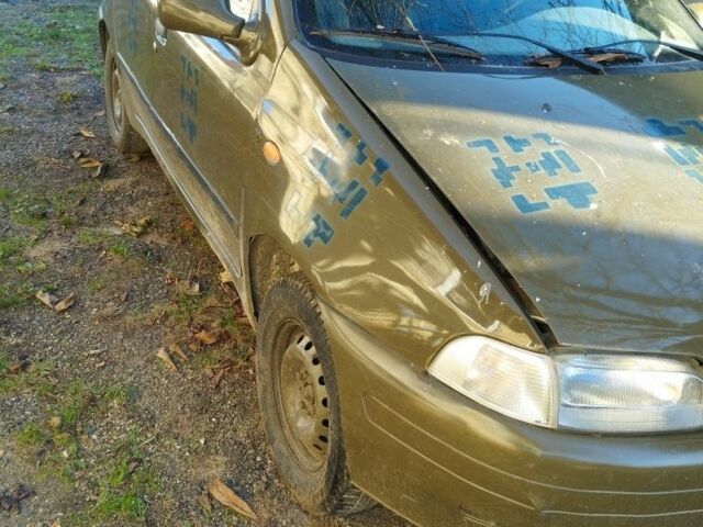 Серый Фиат Пунто, объемом двигателя 1 л и пробегом 230 тыс. км за 1000 $, фото 2 на Automoto.ua