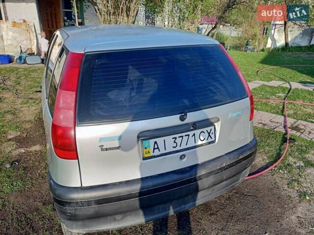 Серый Фиат Пунто, объемом двигателя 1.2 л и пробегом 302 тыс. км за 1150 $, фото 4 на Automoto.ua