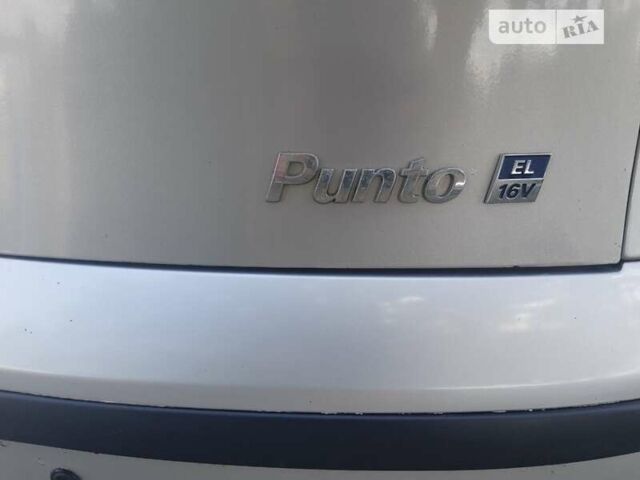 Серый Фиат Пунто, объемом двигателя 1.24 л и пробегом 260 тыс. км за 2222 $, фото 4 на Automoto.ua