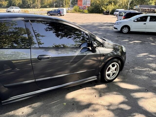 Серый Фиат Пунто, объемом двигателя 1.2 л и пробегом 270 тыс. км за 3999 $, фото 4 на Automoto.ua
