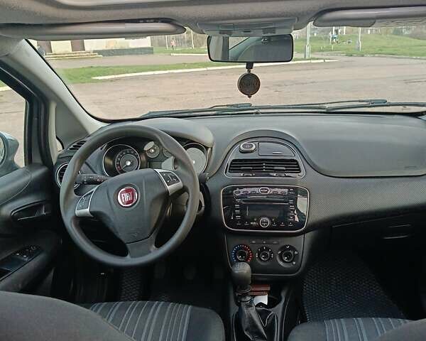 Серый Фиат Пунто, объемом двигателя 1.24 л и пробегом 206 тыс. км за 5099 $, фото 10 на Automoto.ua