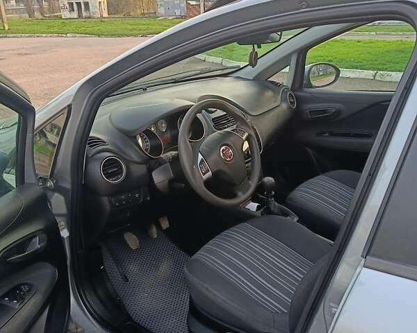 Серый Фиат Пунто, объемом двигателя 1.24 л и пробегом 206 тыс. км за 5099 $, фото 19 на Automoto.ua