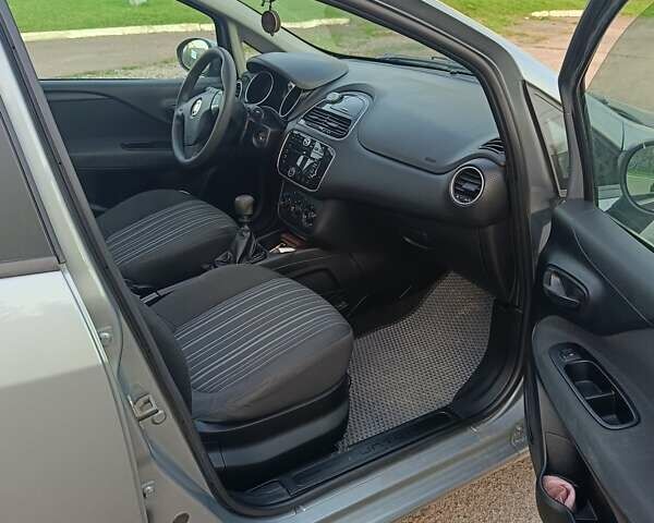 Серый Фиат Пунто, объемом двигателя 1.24 л и пробегом 206 тыс. км за 5099 $, фото 8 на Automoto.ua