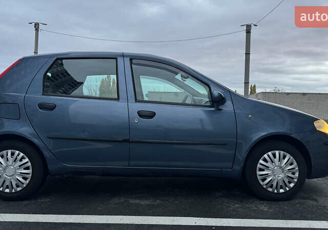 Синий Фиат Пунто, объемом двигателя 1.24 л и пробегом 168 тыс. км за 3500 $, фото 4 на Automoto.ua