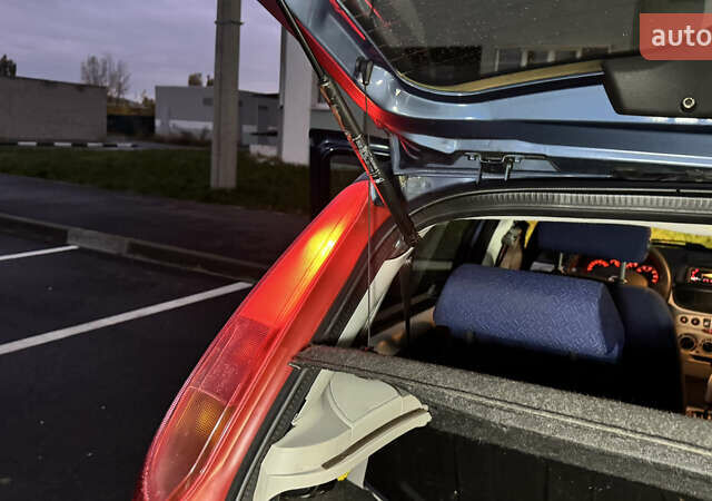 Синий Фиат Пунто, объемом двигателя 1.24 л и пробегом 168 тыс. км за 3500 $, фото 44 на Automoto.ua