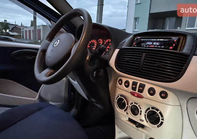 Синий Фиат Пунто, объемом двигателя 1.24 л и пробегом 168 тыс. км за 3500 $, фото 38 на Automoto.ua