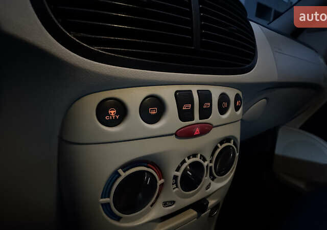 Синий Фиат Пунто, объемом двигателя 1.24 л и пробегом 168 тыс. км за 3500 $, фото 61 на Automoto.ua