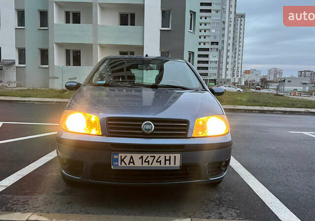 Синий Фиат Пунто, объемом двигателя 1.24 л и пробегом 168 тыс. км за 3500 $, фото 5 на Automoto.ua
