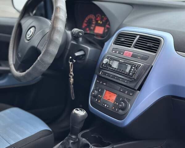 Синий Фиат Пунто, объемом двигателя 1.37 л и пробегом 160 тыс. км за 3499 $, фото 11 на Automoto.ua