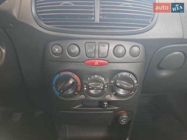 Синий Фиат Пунто, объемом двигателя 1.24 л и пробегом 126 тыс. км за 4500 $, фото 18 на Automoto.ua