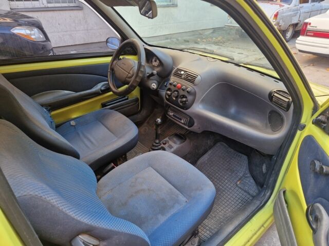 Желтый Фиат Сейченто, объемом двигателя 0.9 л и пробегом 260 тыс. км за 950 $, фото 4 на Automoto.ua