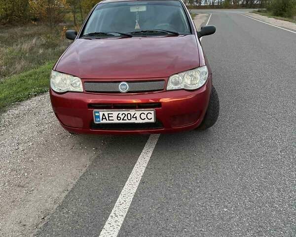 Красный Фиат Сиена, объемом двигателя 1.24 л и пробегом 175 тыс. км за 2700 $, фото 3 на Automoto.ua