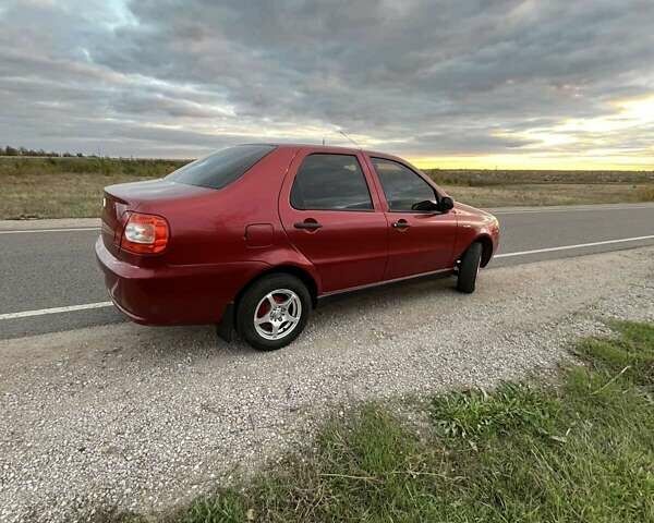 Красный Фиат Сиена, объемом двигателя 1.24 л и пробегом 175 тыс. км за 2700 $, фото 2 на Automoto.ua