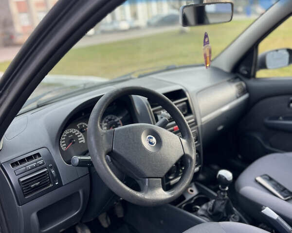 Серый Фиат Сиена, объемом двигателя 1.2 л и пробегом 235 тыс. км за 2550 $, фото 5 на Automoto.ua