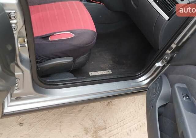 Серый Фиат Сиена, объемом двигателя 1.2 л и пробегом 311 тыс. км за 3000 $, фото 13 на Automoto.ua