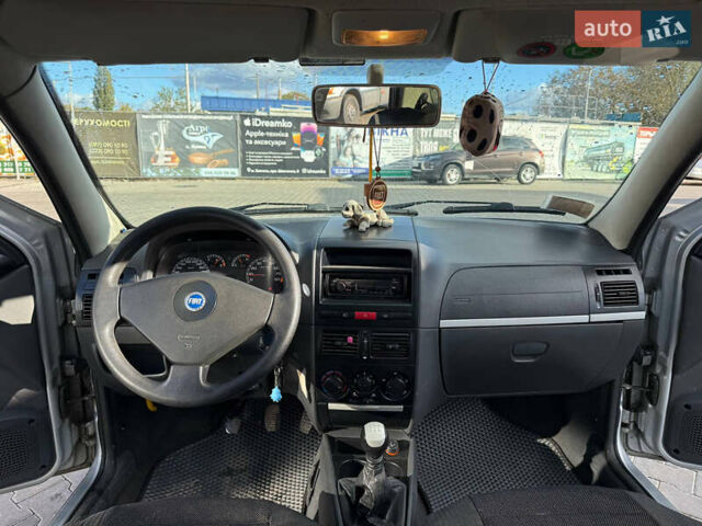 Серый Фиат Сиена, объемом двигателя 1.24 л и пробегом 190 тыс. км за 2350 $, фото 11 на Automoto.ua