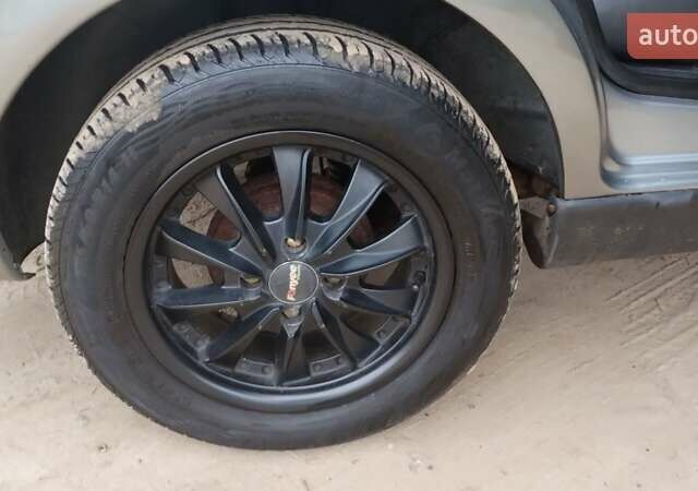 Серый Фиат Сиена, объемом двигателя 1.2 л и пробегом 311 тыс. км за 3000 $, фото 2 на Automoto.ua