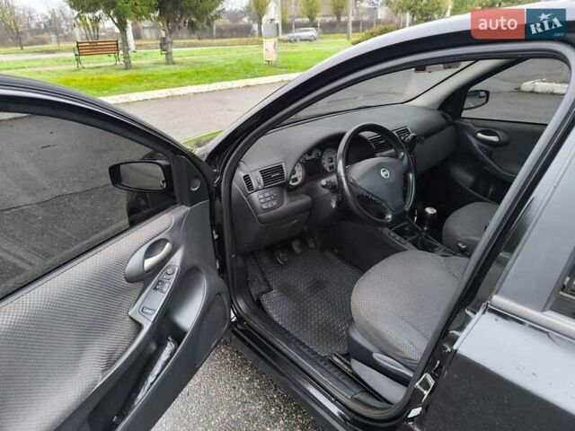 Черный Фиат Стило, объемом двигателя 1.6 л и пробегом 156 тыс. км за 4500 $, фото 9 на Automoto.ua