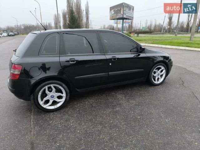 Черный Фиат Стило, объемом двигателя 1.6 л и пробегом 156 тыс. км за 4500 $, фото 5 на Automoto.ua