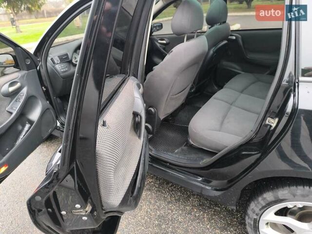 Черный Фиат Стило, объемом двигателя 1.6 л и пробегом 156 тыс. км за 4500 $, фото 10 на Automoto.ua