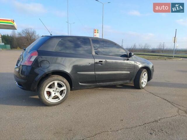 Черный Фиат Стило, объемом двигателя 1.6 л и пробегом 203 тыс. км за 2700 $, фото 6 на Automoto.ua