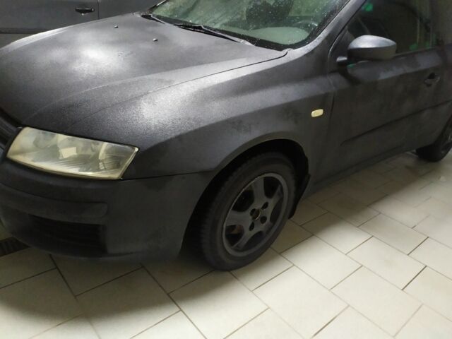 Черный Фиат Стило, объемом двигателя 1.9 л и пробегом 100 тыс. км за 1400 $, фото 2 на Automoto.ua