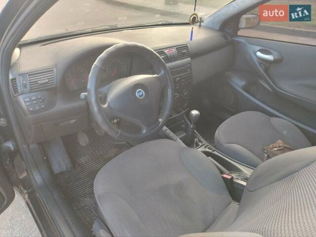 Черный Фиат Стило, объемом двигателя 1.6 л и пробегом 203 тыс. км за 2700 $, фото 11 на Automoto.ua