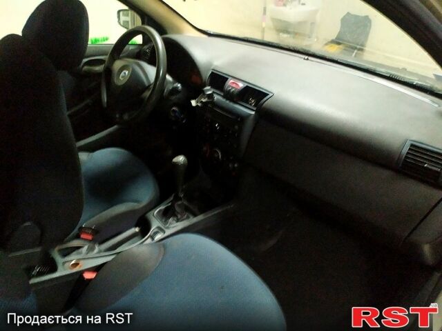 Черный Фиат Стило, объемом двигателя 1.9 л и пробегом 100 тыс. км за 1400 $, фото 5 на Automoto.ua