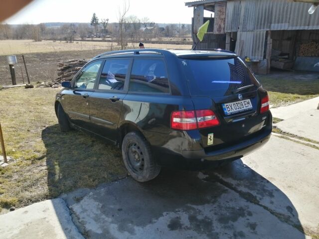 Черный Фиат Стило, объемом двигателя 1.6 л и пробегом 180 тыс. км за 4500 $, фото 8 на Automoto.ua