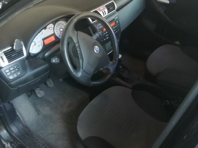 Черный Фиат Стило, объемом двигателя 1.6 л и пробегом 180 тыс. км за 4500 $, фото 9 на Automoto.ua