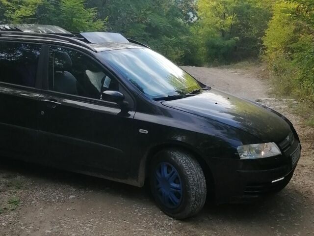 Черный Фиат Стило, объемом двигателя 1.6 л и пробегом 180 тыс. км за 4500 $, фото 5 на Automoto.ua