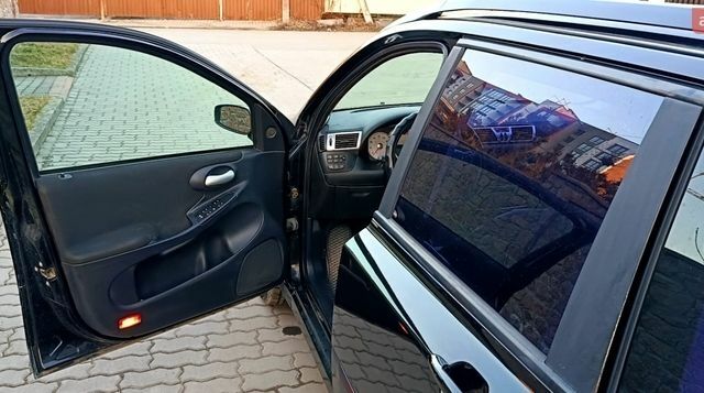 Черный Фиат Стило, объемом двигателя 1.6 л и пробегом 181 тыс. км за 4500 $, фото 13 на Automoto.ua