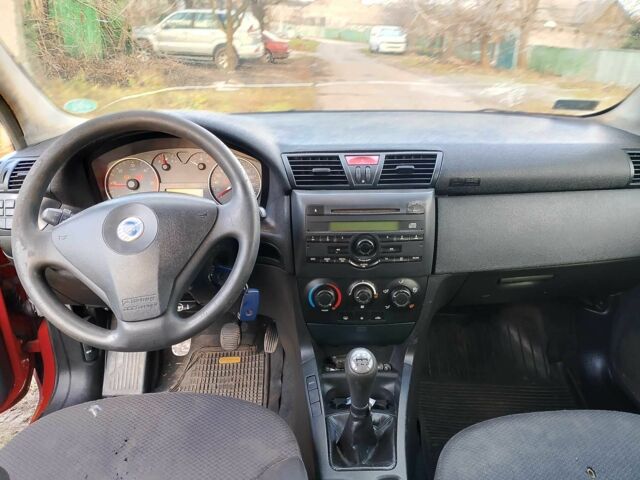 Красный Фиат Стило, объемом двигателя 1.9 л и пробегом 10 тыс. км за 3300 $, фото 7 на Automoto.ua