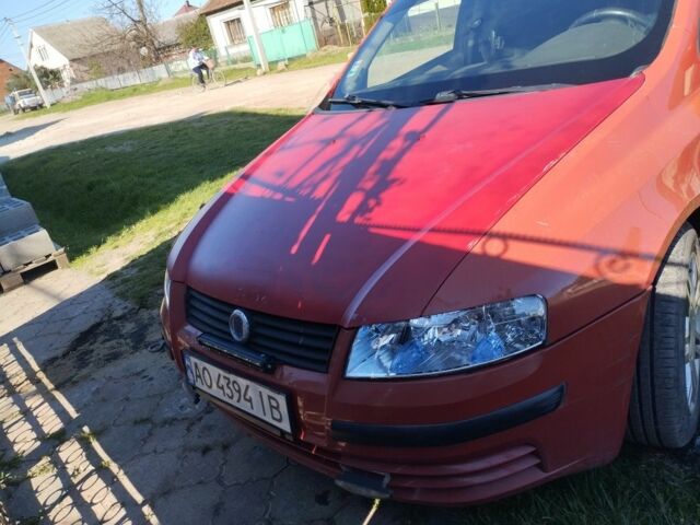 Красный Фиат Стило, объемом двигателя 1.9 л и пробегом 363 тыс. км за 3500 $, фото 2 на Automoto.ua