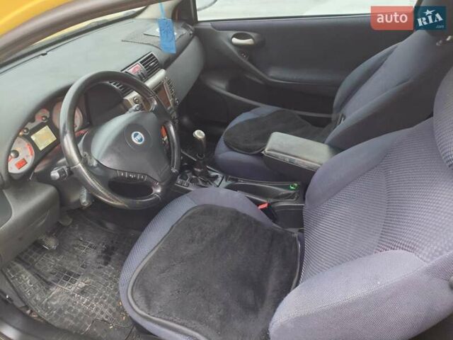 Жовтий Фіат Стіло, об'ємом двигуна 2.5 л та пробігом 260 тис. км за 2899 $, фото 10 на Automoto.ua