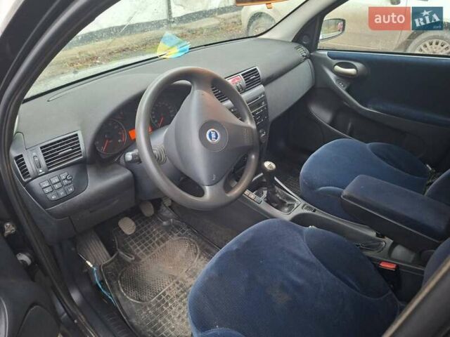 Серый Фиат Стило, объемом двигателя 1.8 л и пробегом 206 тыс. км за 2550 $, фото 5 на Automoto.ua