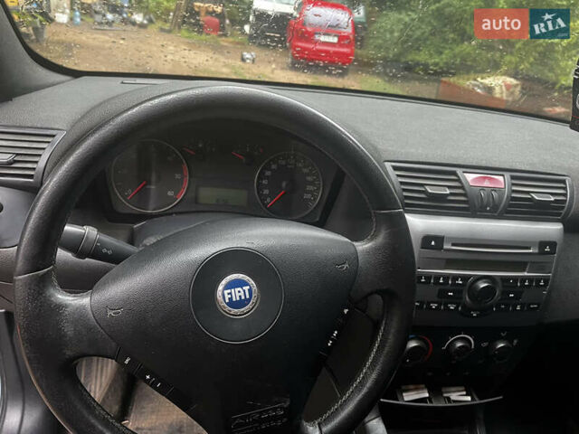 Серый Фиат Стило, объемом двигателя 1.9 л и пробегом 420 тыс. км за 2400 $, фото 4 на Automoto.ua