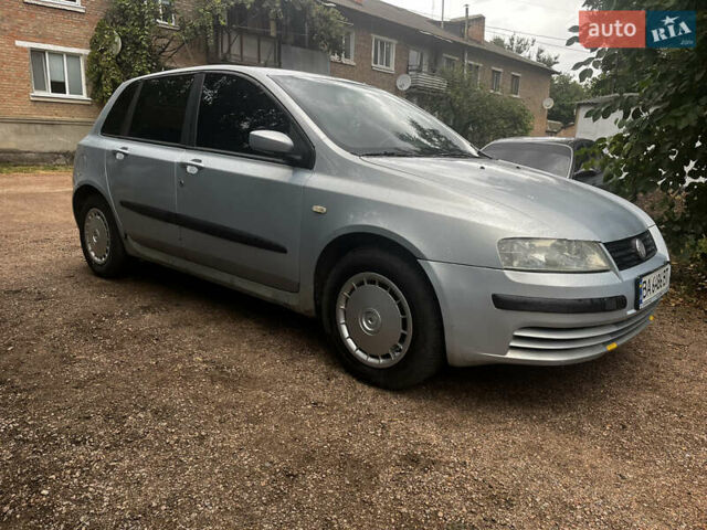 Серый Фиат Стило, объемом двигателя 1.9 л и пробегом 420 тыс. км за 2400 $, фото 1 на Automoto.ua